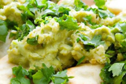 Crispy Baked Chicken Taquitos Served with Fresh Guacamole