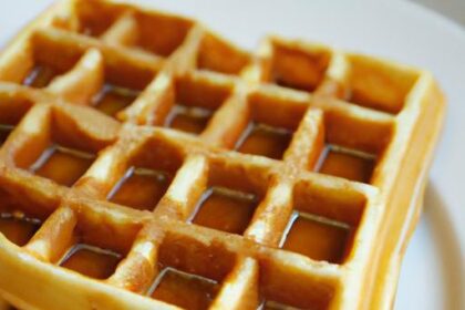 Fluffy Gluten-Free Waffles Drizzled with Sweet Maple Syrup